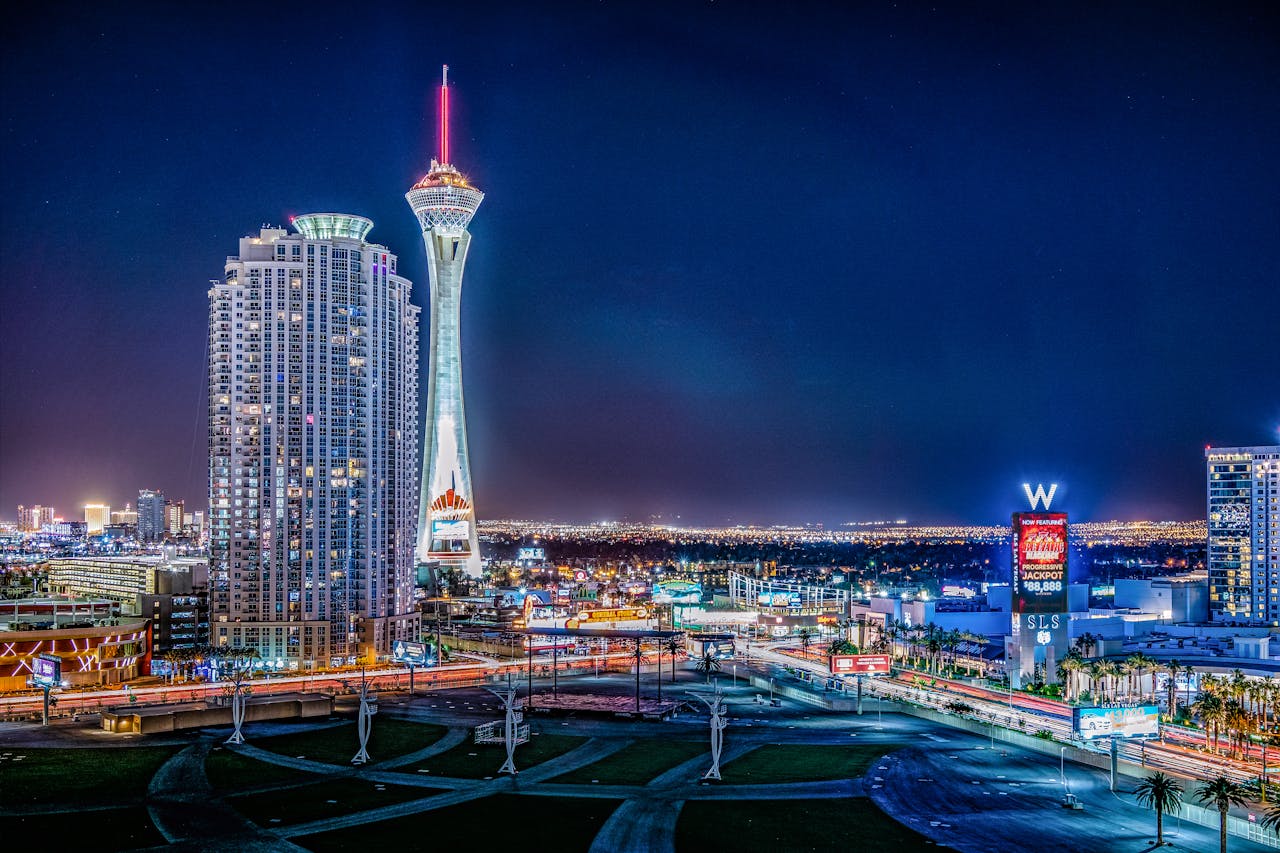 Illuminated Las Vegas skyline showcasing the vibrant nightlife and iconic Stratosphere Tower.